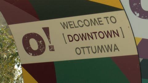 Main Street America tours downtown Ottumwa evaluating community development