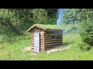 Building bushcraft house in the woods. Clay roof and fireplace. Catch and cook.