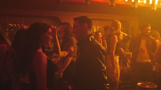 Couple dancing together at a nightclub  - Free Stock Video