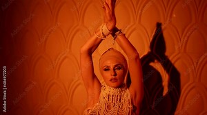 enigmatic woman is dancing alluring oriental dance, sensuality and seduction