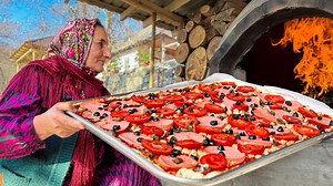 Learn how to make a delicious homemade pizza with a crispy crust right out of the hot oven! In this easy tutorial, discover why adding extra sausage to your pizza is always a tasty benefit. Perfect for pizza lovers at any cooking skill level! #cooking #pizza #oven #recipe | Sweet Village