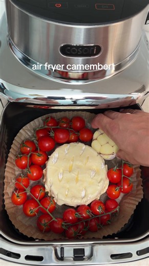 air fryer camembert wrap camembert in puff pastry and brush with egg wash, add cherry tomatoes and garlic, drizzle with olive oil, then season with salt and black pepper air fry at 180C/356F for 20 minutes until golden and melty serve with a fresh baguette #airfryerrecipes #camembert #puffpastry #cheeselover #foodtok