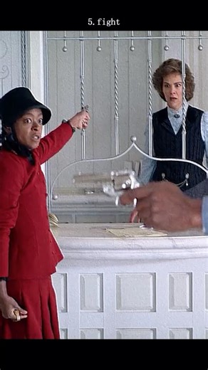 #movie The Harder They Fall: Trudy Smith’s Bank Scene – When Laughter Turns to Lead