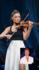A woman steps onto the *America’s Got Talent* stage, violin in hand, her expression calm—too calm. Gabriella introduces herself, and the judges brace for the usual. She starts playing. Simon’s eyes glaze over. His hand moves toward the red buzzer. Then—**BAM!** The violin drops. What happens next leaves the judges gasping, Simon frozen, and the internet EXPLODING. Watch now! 👇 | Talent US