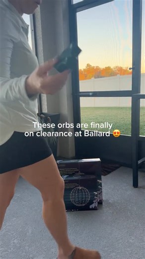 Emily | Home Decor | DIY on Instagram: "I was so excited to find these light up orbs on clearance at Ballard designs because I have been wanting them for years so they are on clearance right now. I used them to decorate my back porch to add some light to my back porch so I can see it from my living room, which is just super festive. I moved the planter back here because I needed to decorate my front porch for Christmas sooooo this gave me an empty space to put them in (go figure 😂) and I used r