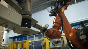 The device controlled by the console puts the product on a metal stand. Aircraft plant in Russia