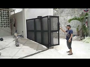 A sloping garage can use a practical sliding door
