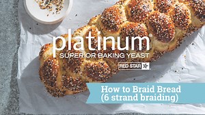 Get full Everything Bagel Challah recipe: https://bit.ly/3jSmRuF This six-strand braided bread is enriched with honey, oil, and eggs for a soft crumb that’s rich and slightly sweet. The everything bagel seasoning on top truly takes it over the top. Watch the how-to video for braiding tips. | Red Star Yeast