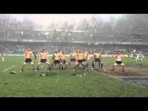 New Zealand Rugby team All Blacks Sevens perform shirtless HAKA dance in the rain
