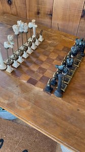 $195 • Antique Folding Upholstery Measuring Table with Inlaid Chessboard & Chess Pieces This unusual antique upholstery measuring table offers a fascinating dual purpose—both as a practical work surface and as a chess table. Crafted with beautifully turned round legs that fold neatly for easy storage and transport, the piece retains its natural patina, showing the character of age without refinishing. It has been carefully stabilized for continued use while preserving its authenticity. The table