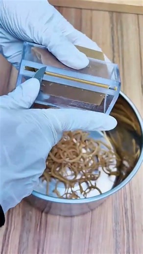 Slicing block material into curly strips with precision tool