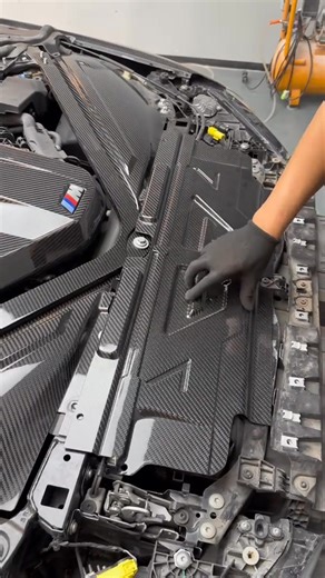 166K views · 2.6K reactions |  Engine Bay Glow-Up!  For BMW G80 M3 / G82 G83 M4 / G87 M2 ✨ Carbon fiber engine cover ✨ Triangular strut bars & intake covers ✨ Cooling panel upgrade Lightweight ✅ Race-inspired ✅ OEM fit ✅  DM us to upgrade your engine bay today! #BMWM #CarbonFiber #EngineBayMods #CarEnthusiast | Jcsportline | Facebook