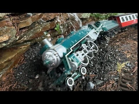 PASSENGER TRAIN CRASHES INTO A ROCK SLIDE
