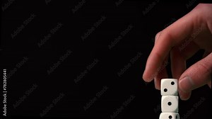 Stacking D6 dices on top of each other creating a dice tower.