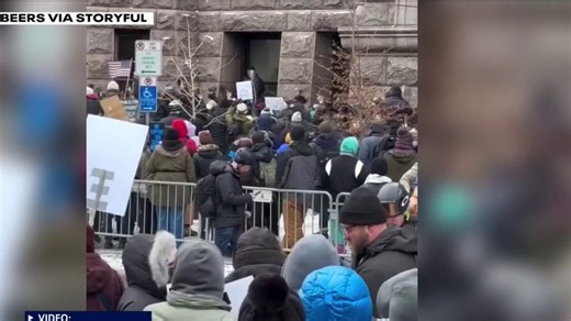 Woman rescues Jake Lang from Minneapolis counter protesters