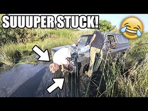 STUCK in the Swamp! Mudding with LIFTED TRUCKS!!