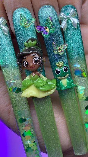 ✨🐸💚 Bringing fairytales to life, one nail at a time! I created a full tutorial on sculpting the cutest little frog prince, and I also did a separate video dedicated just to my girl Tiana! 🌿👑 These shimmering green and aqua tones, paired with 3D butterflies and bows, gave this set that perfect enchanted vibe. 🦋✨ I’m loving this Disney princess series so far, and I can’t wait to see who’s next in line for a royal glow-up. Which Disney princess should I bring to life next? 💕👸 Products Used: 