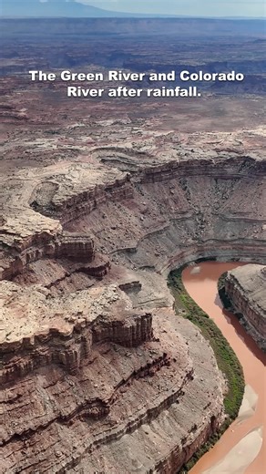Few places in the world show nature’s artistry like this. 🌊❤️ At the Confluence, the Green River and the Colorado River meet deep within Canyonlands National Park — a sight that’s stunning on any day. But after a rainstorm, it’s transformed. The canyon walls release iron-rich sediment into the water, turning the river a vivid red as it merges with the steady green current flowing from the north. From above, the contrast is striking — a swirl of color and motion that tells the story of Utah’s wi