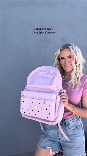 Okay wait…where was this when we were in school because I would’ve made this my entire personality 😭 This Crocs Nylon backpack is actually the cutest back to school bag AND you can customize it with Jibbitz charms. If you’re back to school shopping for a backpack this one’s for you 💗✨ #crocs #backtoschool #backtoschoolshopping #schoolbag #backpack