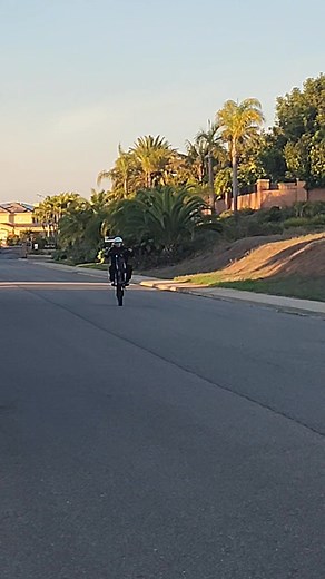 My daughter getting close to finding 'balance point' on her wheelies. Also I changed her brake pads at 500 miles: The rear pads had a lot of life left. The front pads were toast. | Max Wettstein