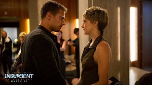 Theo James & Shailene Woodley stand together. #Insurgent hits theaters 3/20! Get TIX: http://insur.gent/tix | Divergent Series