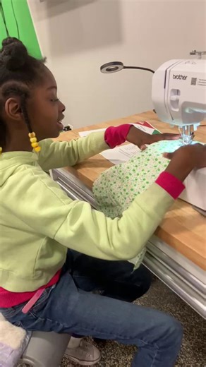 Desi* had her first sewing machine lesson and is already planning her next project! First up: bonnets 🧵 #SewingMachine #FindYourSpark #FunWithFriends | Friends of the Children - Chicago