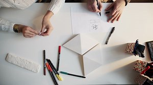 Architects planning at a desk with blueprints - Free Stock Video