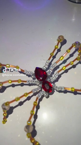 My first try at making spiders with beads , rhinestones & wire 🕷️ #fyp #beads #spider #crafts #diy