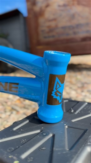 Coyote custom powder coating on Instagram: "Fresh new setup on this @redlinebicycles prolinepro! Vinyl pulled graphics . Done in @prismaticpowders highland bronze, rapid blue, blackjack and clear vision. Ready in time for the 2026 season. Interested in a custom frame ? Let’s do something rad!! . . . . . . #usabmx #azbmxzarate #powdercoating #azpowdercoating #coyotecustompowdercoating"
