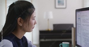 Chronic burnout in software engineer tired solving problem fix bug work hard at home office desk. Coder job for young asian talent woman cloud computing cyber security reskill upskill for workforce.