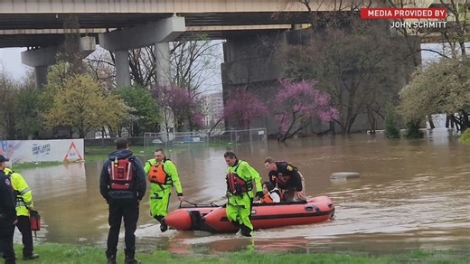 Woman rescued from rising flood water in downtown Cincinnati