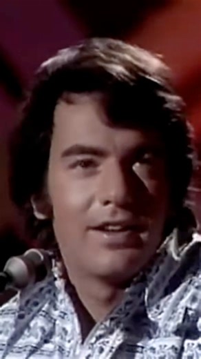 Neil Diamond performed “Brother Love’s Traveling Salvation Show” on ‘The Johnny Cash Show’ in 1971, marking a pivotal shift in his early career from folk songwriter to dynamic showman. | Neil Diamond