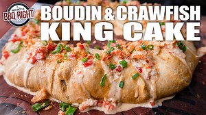 Quick, Easy and Delicious! King Cake Recipe using Boudin Sausage and a Spicy Crawfish Cheese Dip, topped with green onions and crushed Pork Rinds. Boudin King Cake with Crawfish Cheese Dip Recipe Ingredients: - 3 cans Pillsbury Buttery Crescent Rolls - 4 links Boudin Sausage - 1lb crawfish tails - 1 block cream cheese - softened - ½ small onion - diced - ½ red bell pepper - diced - 3 cloves garlic - minced - 16oz white queso (cheese dip) - 1 package pork cracklin’ or pork rinds - crushed - 4-5 g