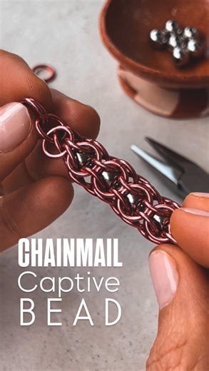 Handmade Chainmail Jewelry | By İlksen Baysaling on Instagram: "🛠️ CAPTIVE BEAD is what this chainmail weave is called. Challenge of this technique is to find the correct size of jump rings and the bead in order to fit it in. But when you manage that, it is such an enjoyable weave. Have you tried it?"