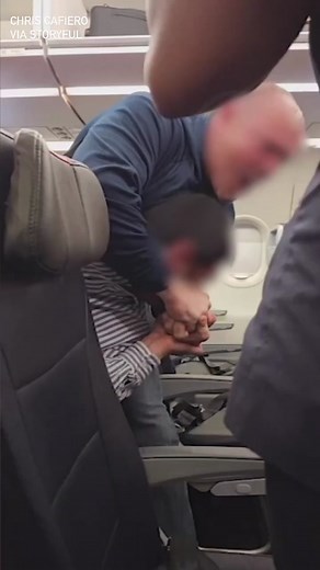 A Tampa man was put in a headlock, removed from a flight and arrested for “unruly behavior” at Tampa International Airport, on March 19, according to arrest records. This footage, filmed by Chris Cafiero, shows 29-year-old Shail Patel being escorted off an American Airlines plane preparing to fly from Tampa to Philadelphia. According to local reports citing court documents Patel was drunk aboard the flight and was “antagonizing passengers, calling flight attendants names, threatening passengers 