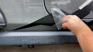Apply a large vinyl decal to the side of your vehicle. A step-by-step tutorial and video using the wet method. https://thecraftyblogstalker.com/apply-large-vehicle-decals-wet-method/ | The Crafty Blog Stalker | Facebook