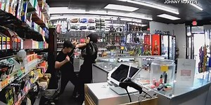 GRAPHIC: Smoke shop owner fights back, stabs attempted robber