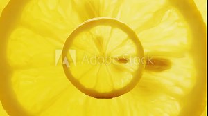 Lemon stop motion animation. Looping animation of round yellow lemon slice, juicy citrus, fresh organic fruit close up
