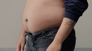 Overweight Man Closeup Of Belly Trying To Stock Footage SBV-321554681 - Storyblocks