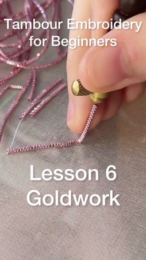 Lesson 6 : Goldwork✨⁣ The full tutorial is on my YouTube channel Link is in my Bio⁣ ⁣⁣⁣ Please comment any questions you may have⁣ ⁣⁣⁣ .⁣⁣⁣ .⁣⁣⁣ .⁣⁣⁣ ⁣⁣ #tambourhook #luneville #embroidery#embroideryytutorial #learnembroidery #embroideryart #chainstitch #satisfying #stitch #asmr #sew #crochet #craft #thread #sequins #sequinsembroidery #textiles #satisfying #asmr #beadembroidery #embellishment #beadwork #couture #tutorial #rhinestones #bordado #crossstitch #tassel