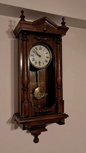 Vintage pendulum wall clock