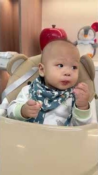 11-month-old baby eating independently in an immersive way #Self-FeedingBaby #IndependentEating