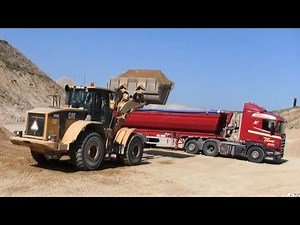 Loading Scania Trucks With The Cat 966 Wheelloader