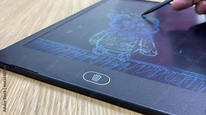 Disposable bin icon sign on black drawing sketching pad on table. Delete button. Junk and trash can symbol on electronic pad.