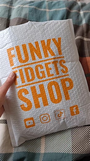 Opening my @Funky Fidgets Shop 𝙻𝚃𝙳 ᵗᵐ order with a couple of surprises! ✨ Thank you to my lovely partner Finn who supports my fidget addiction 😅