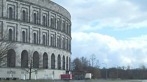 15 reactions | The city of Nuremberg in Bavaria is home to some of the largest buildings built by the Nazis: the Zeppelin Tribune, where hundreds of thousands of Nazis gathered during party congresses to listen to speeches by Adolf Hitler, and the congress hall, which looks like a Roman coliseum and was never finished. The question now facing Nuremberg: when Nazi ruins begin to crumble, is it better for Germany to rip them down or restore them? | AFP News Agency | Facebook