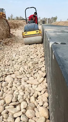 Operating a Road Roller at a Construction Site