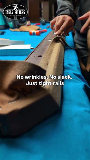 Recovering a pool table. No wrinkles. No slack. Just tight rails