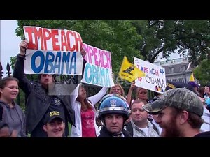 DC:PROTESTERS AT WH- 'IMPEACH OBAMA' SIGNS
