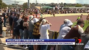 Thousands have paid tribute to family and friends affected by the Hillcrest jumping castle tragedy at a fundraising AFL match in Devonport. Players and supporters stood for a moment of silence to pay their respects. 7NEWS.com.au #7NEWS 7NEWS at 6pm | More local news: www.7news.com.au/news/vic #7NEWS | 7NEWS Melbourne